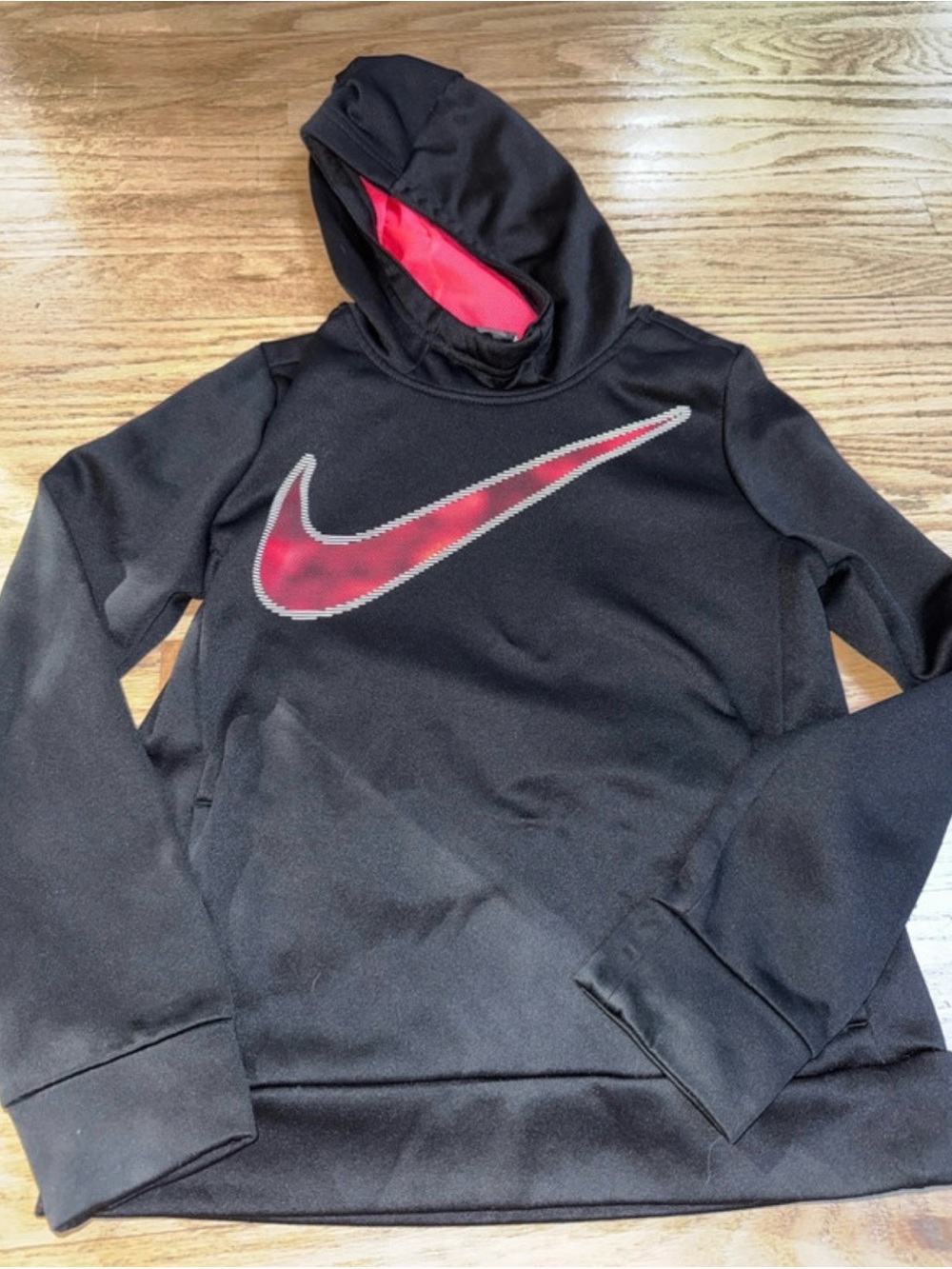 Nike Kids Black Hoodie with Pink Swoosh and pink Hood Lining